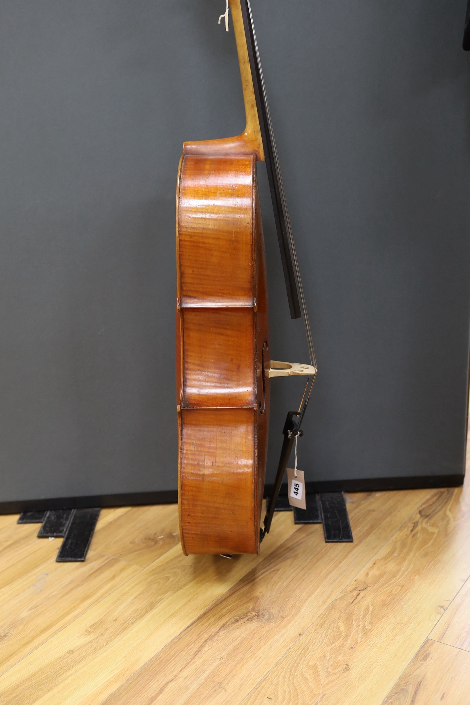 An early 20th century French half size cello, with soft case and bow